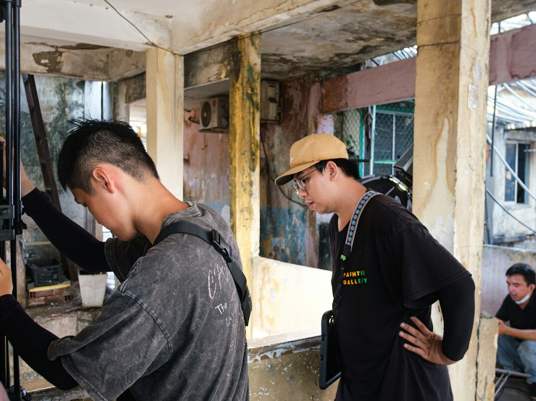 Reportage crew preparing a camera on location